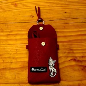 Roma clutch bag or purse. Shoulder strap comes with.